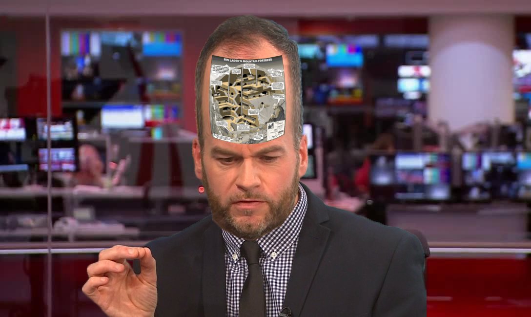 If you zoom in to the forehead here it's a diagram of Osama Bin Laden's hideout. Lol.