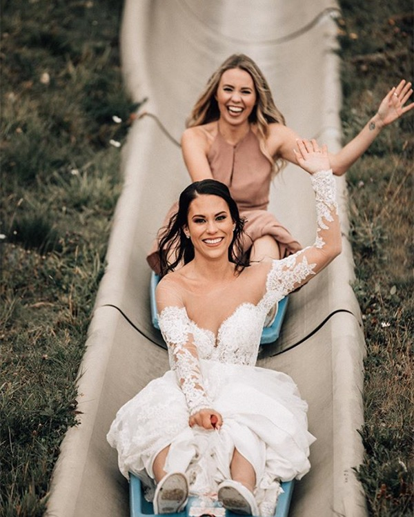 Happy New Year! We're saying good-bye to 2020 like these two! Photo by @bethanysmallphoto
Bridesmaid in keyhole halter maxi dress style 1502 in Sienna.
