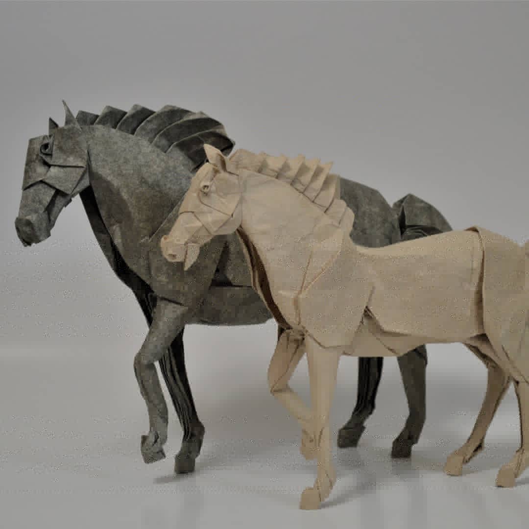 Horse 2.0

Folded from: one 19" (48 cm) square of Dó Paper 
Size: 7" (18 cm) tall

I made more changes than anticipated. Mainly I wanted to add a pleat to the forelegs and fix the ears by adding more paper into the head. 

Hope you like it!