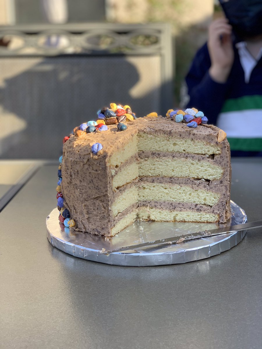 Finally finished my first cake all from scratch: 4 layer vanilla cake, vanilla buttercream mixed with crushed chocolate graham crackers, and topped with chocolate rocks to make a successful (and tasty) Dump Truck Cake 🤌👩‍🍳