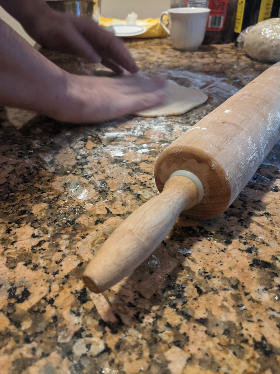 With your dough hydrated and your filling ready, it's time to assemble! Roll out the dough in portions, taking care to keep the rest sealed so it does not dry out. Cut out circles using something circular. I used a cup.