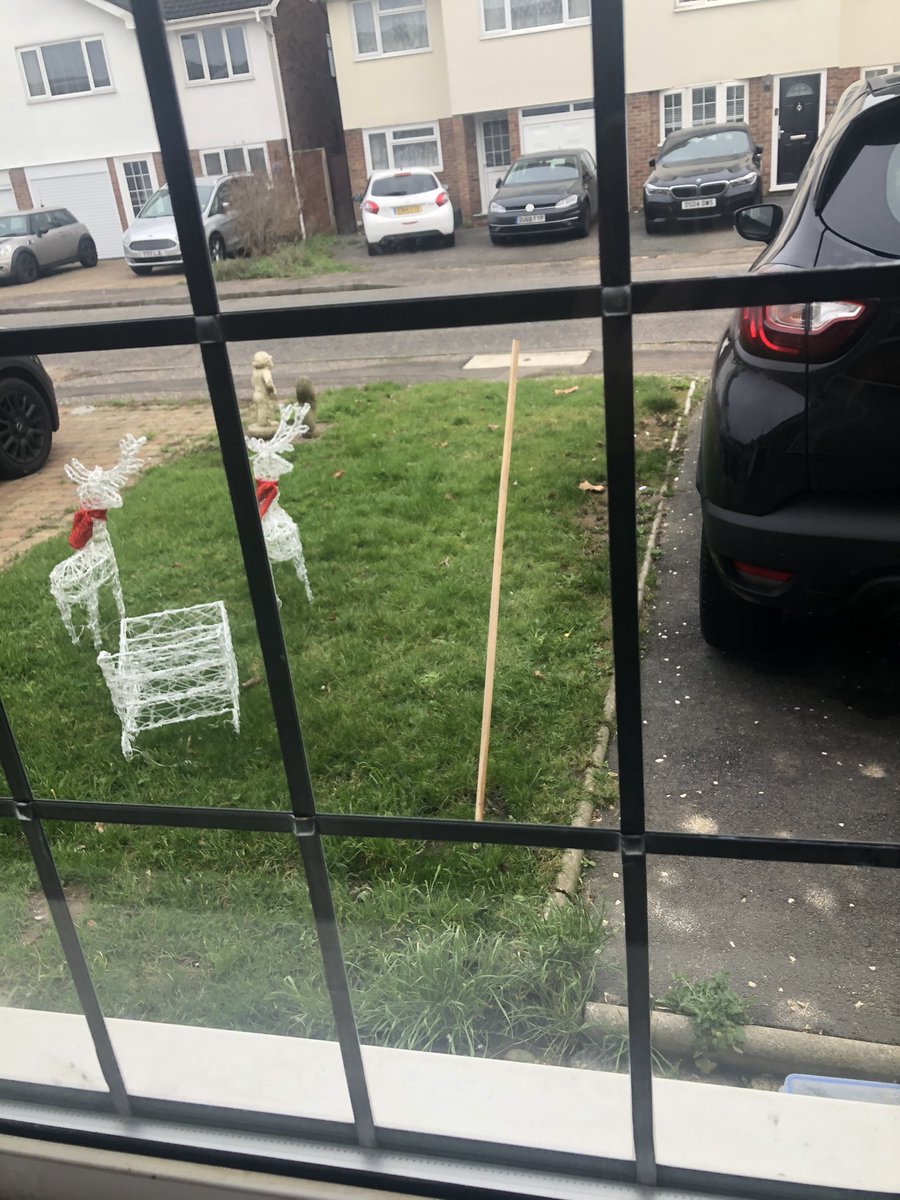 TheTeepster's tweet image. Pls excuse my tatty front garden and the crap reindeer. Have a look though at the rocket that embedded itself in the lawn. Bloody hell. Looking through the window it’s a bit like one of those I am not a robot internet authentications.