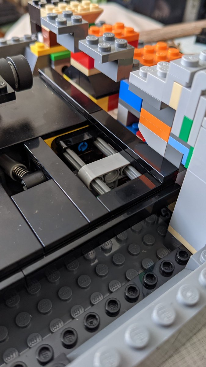 From what will eventually look like a simple grey Nintendo box, you'd never believe the complexity of the structure inside!The engineering to get the cartridge tray hinge working is genuinely amazing.