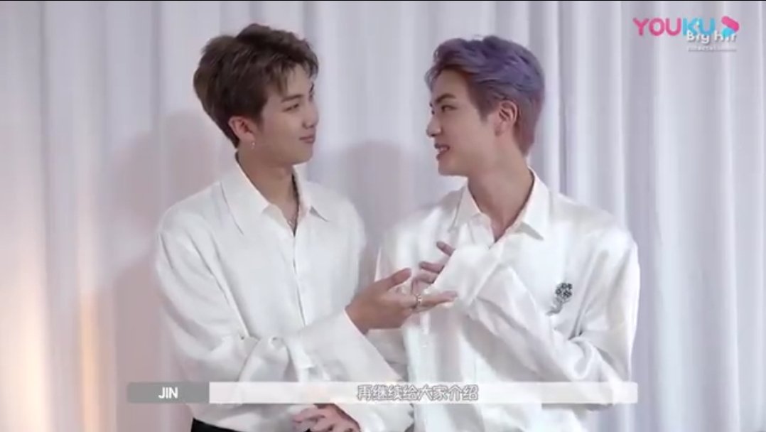 touches while looking at the other 