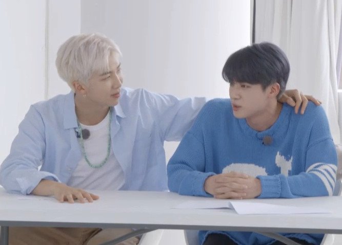 touches while looking at the other 