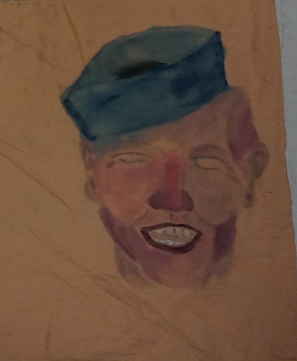 He is also depicted wearing his signature blue hat.