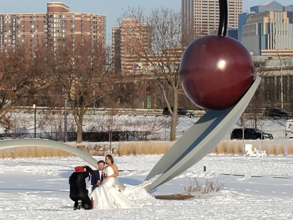 So Minnesota! Getting your picture taken in front of the Cherry and Spoon in the middle of Winter with your wedding attire. #WinterWonderland #Minneapolis <a href="/walkerartcenter/">Walker Art Center</a>