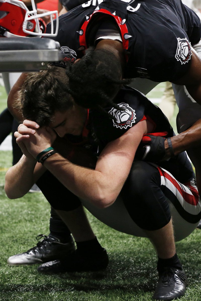 RadiNabulsi's tweet image. You are a walk-on kicker at #UGA. No one really knew who you were before the season started. 
You are replacing a legend. 
You just made the longest kick of your career.
A game winner.
Against a top-10 team in a NY6 bowl game.
How do you celebrate? 
Jack Podlesny gives thanks