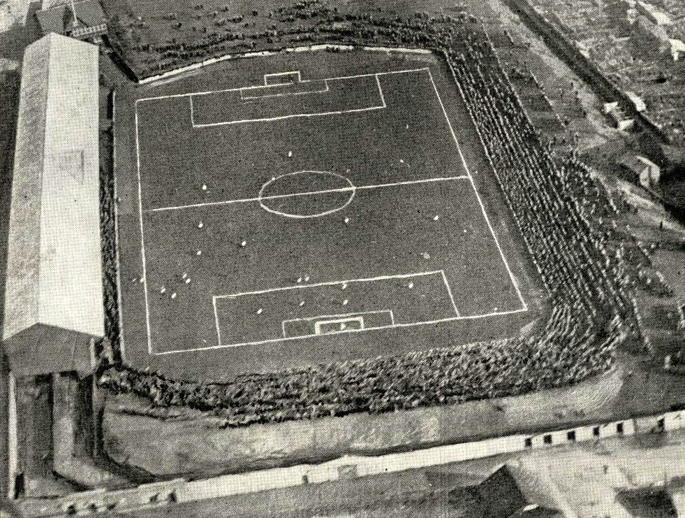 afchistory's tweet photo. Pittodrie from the skies in 1929, not long after the granite facade was built at the Merkland Road end and the Grandstand extended to the full length of the ground https://t.co/CJsigrewTc
