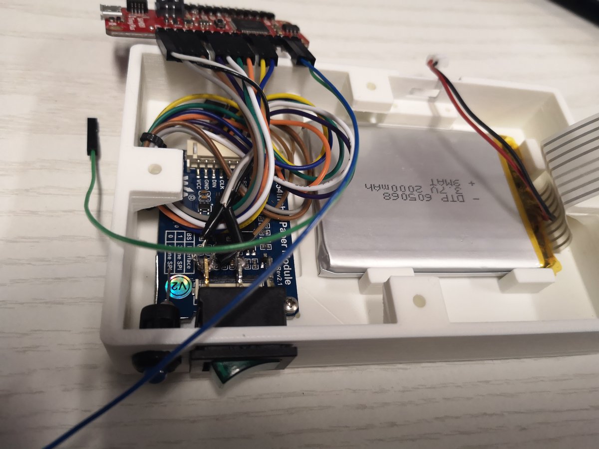 Snapping the rocker switch in and placing the lithium batterywith it's protective plastic shield, before connecting it to the board