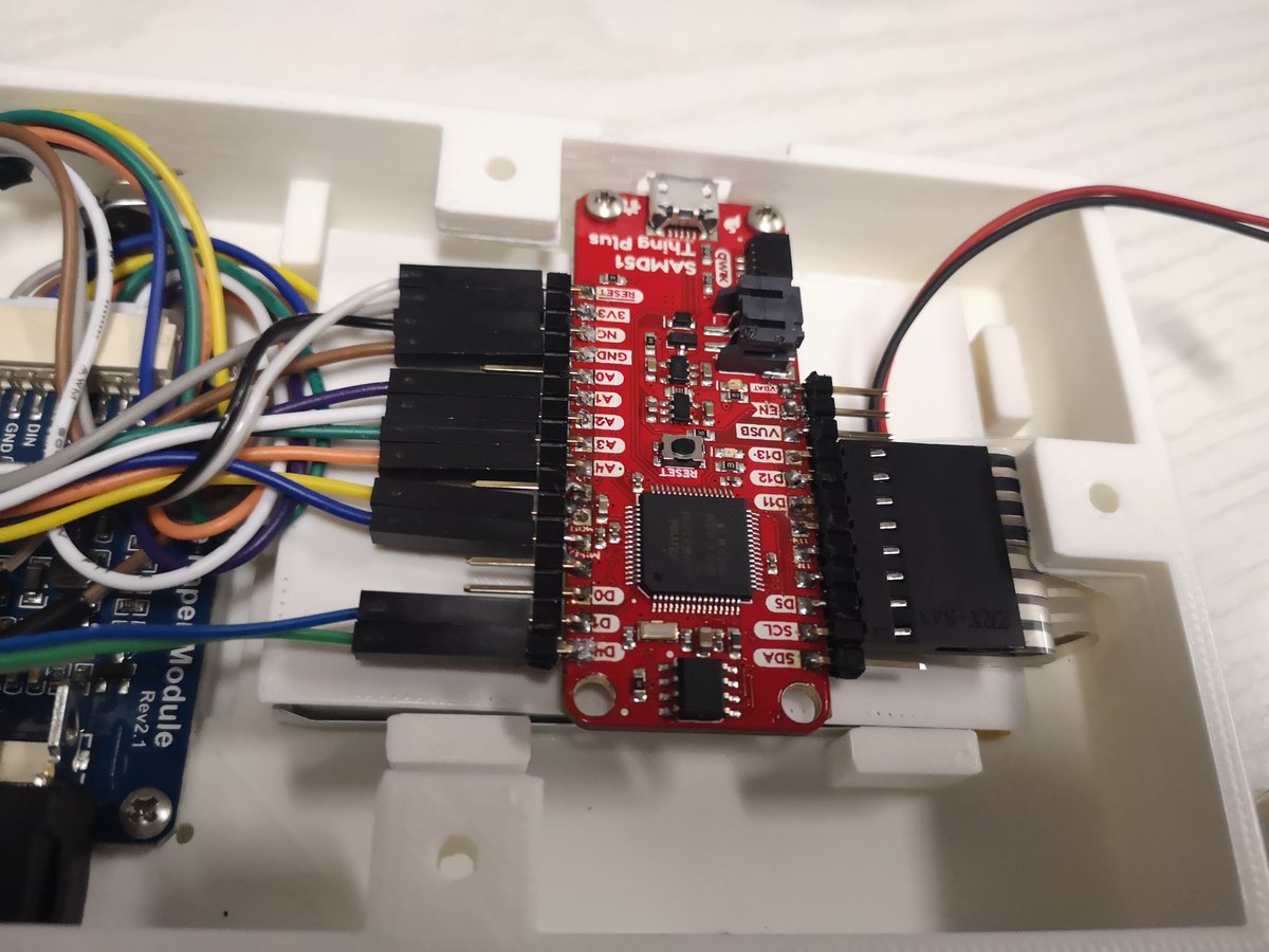 Screwing in the board, and connecting the LEDs