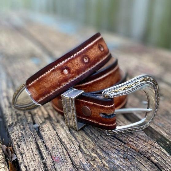 LeatherRoy's tweet photo. Men's Western Leather Belt, Handmade Saddle Vintage Brown Smooth Leather, Silver and Gold Wire Trim Patterned Buckle Set #royleatherco #leatherwork #madeinusa #westernbelt https://t.co/QvkCKCIzCb https://t.co/XIov3urS7t