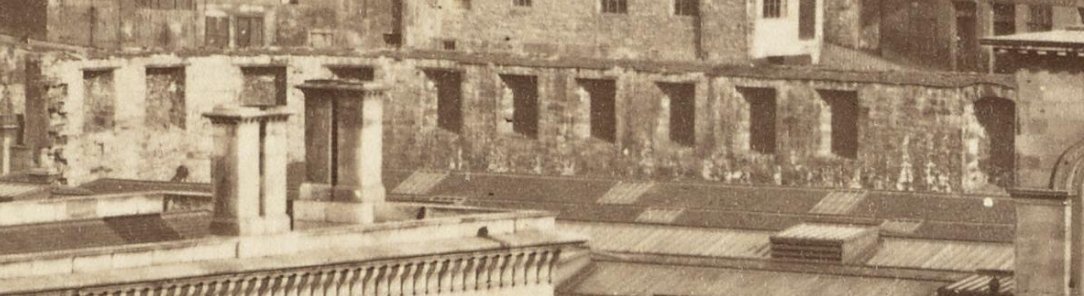 On the alignment of Market Street are the ruinous walls of the old Green Market and Shambles that used to occupy the space below the North Bridge, repurposed as retaining walls for the railway station.