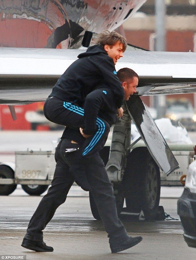 his precious feet must not touch the ground