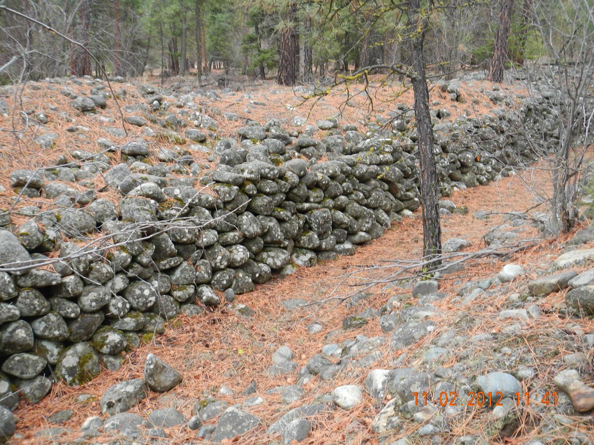 Old timers mined what they could. Here are some stacked boulders alongside their long gone sluice box. Hard back breaking labor. #alluvialgold