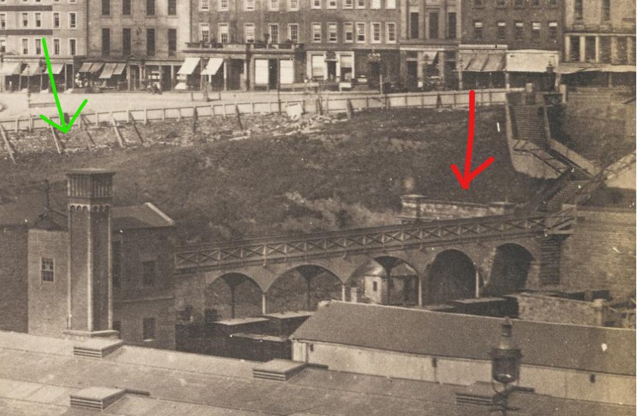 The tunnel is under the red arrow, there is a footbridge across to the booking hall/ waiting rooms from steps accessing Princes Street, and under the green arrow is the distinctive tall building and ornate chimney of the winding house, which hauled trains up the tunnel on a rope