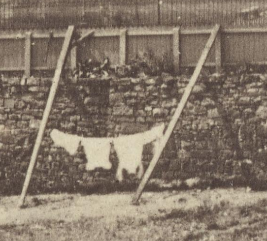 What I love about this is the workers have brought their laundry to dry. It seems so odd that men labouring in filth all day long would dress in light coloured clothing, but there you go!