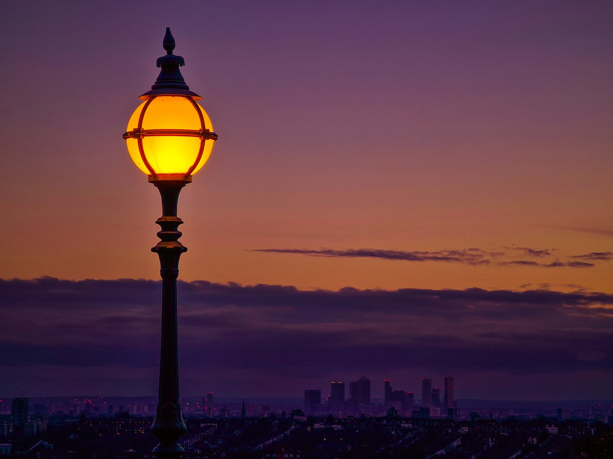 Lamppost and skyscrapers. Same photo, different looks. Photographs can show whatever you want them to show. Worth remembering when you look at the images in the news.