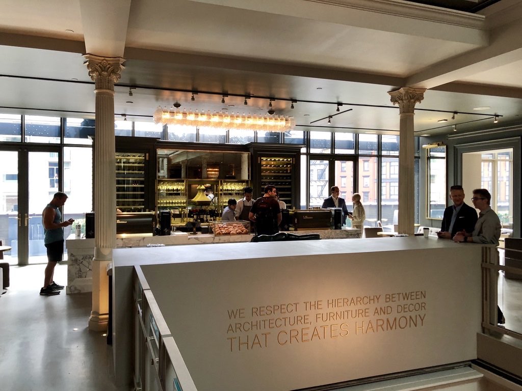 …and here’s NY on opening day. You might want to ask yourself a Peter Lynch question here — have you ever seen this long a line for a furniture store opening before? Actually, have you ever seen people queue in line for a furniture store, period? 10/