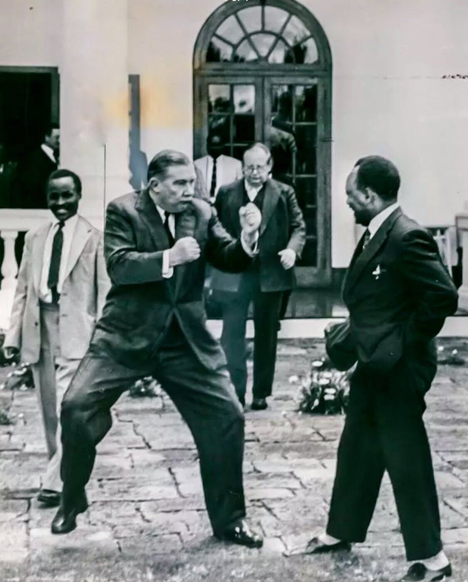 He was later involved - as a representative of Kenya’s white settler community - in the 1961 Lancaster Constitutional talks on Kenya. He is seen here in later years mockingly sparring with KADU leader Ronald Ngala