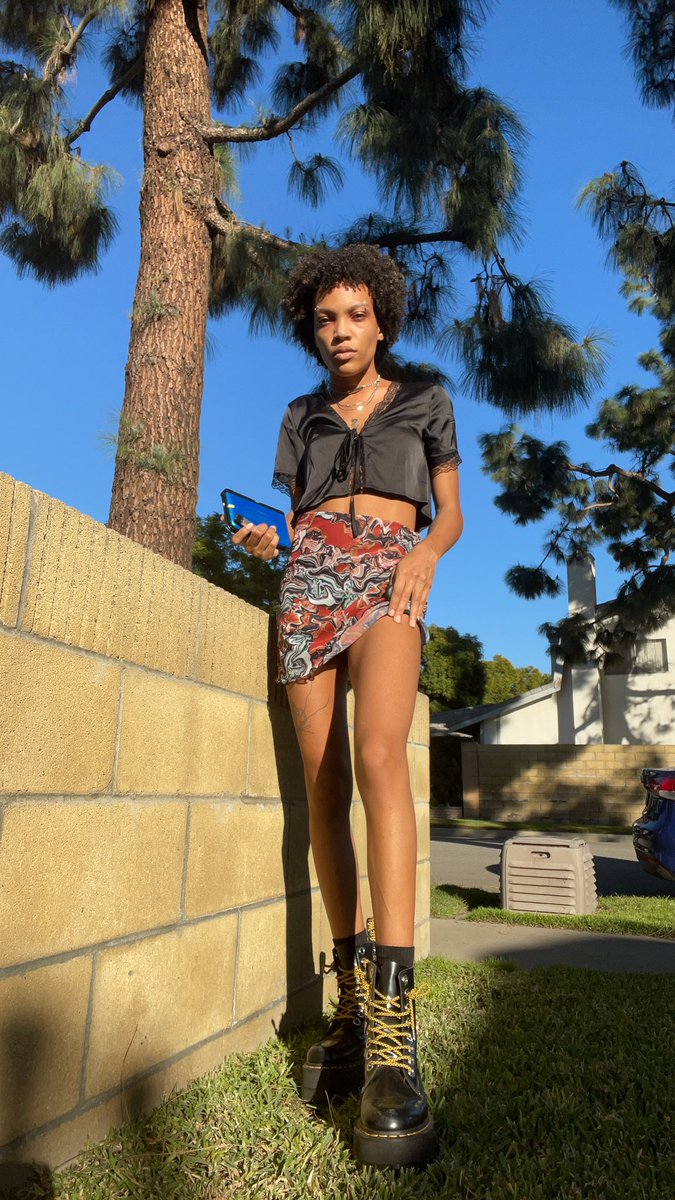 crybbykj's tweet photo. Since SoCal decided to switch seasons again here’s some dyke in skirt content for ur eyes ✨👁 #nonbinary #queertrans #enby #blackenby #nonbinarylesbian https://t.co/H2qjF45QhF