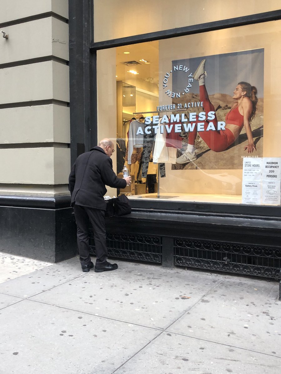 One of the things we noticed on this blustery day is that many buildings along Broadway feature little alcoves where one can find refuge from the elements and the steady flow of humanity. They are perfect for a quick phone call, a bite to eat, text, or a brief conversation.