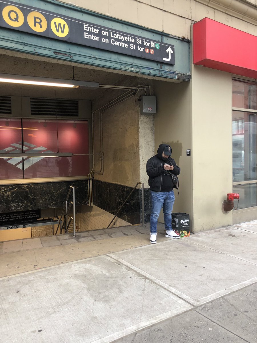 One of the things we noticed on this blustery day is that many buildings along Broadway feature little alcoves where one can find refuge from the elements and the steady flow of humanity. They are perfect for a quick phone call, a bite to eat, text, or a brief conversation.