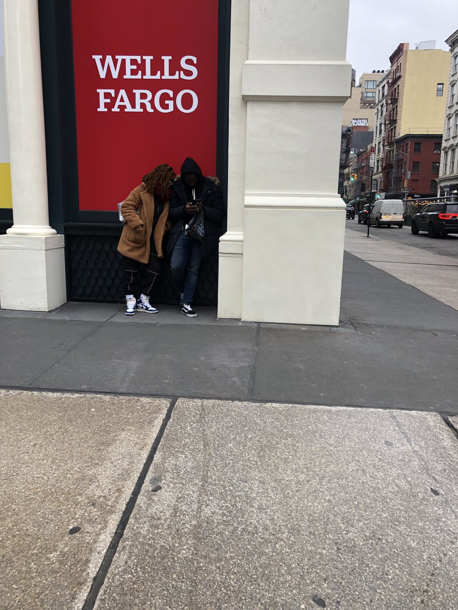 One of the things we noticed on this blustery day is that many buildings along Broadway feature little alcoves where one can find refuge from the elements and the steady flow of humanity. They are perfect for a quick phone call, a bite to eat, text, or a brief conversation.