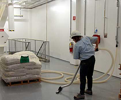 Speaking of messes. Something I've never seen in lab spaces is Central Vacuum System.It is a vacuum cleaner but available everywhere in the building, just plug your hose in the wall and vôila - you have yourself a vacuum!