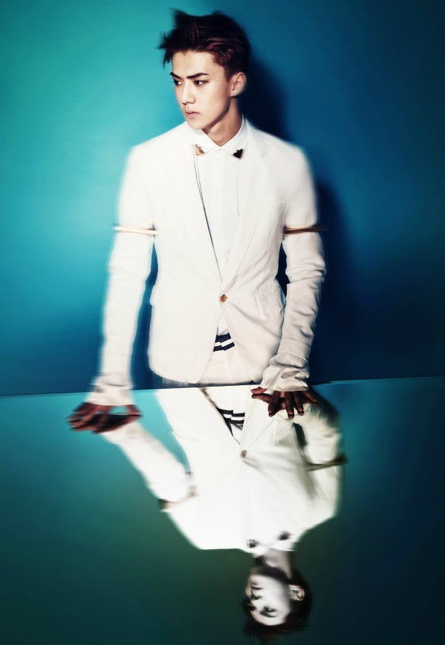 another thing is how conceptualized the version of their photoshoots were, during overdose. featuring sehun and luhan, you can see that there was a mirror used in the shoot, literally showing us how both of them are showing their reflections filtered with more color effects.