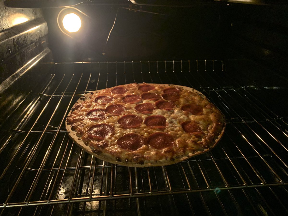 jeeeezpeej's tweet image. Got drunk and forgot about a pizza in the oven and when I remembered and looked in the oven it looked like this...life is good.