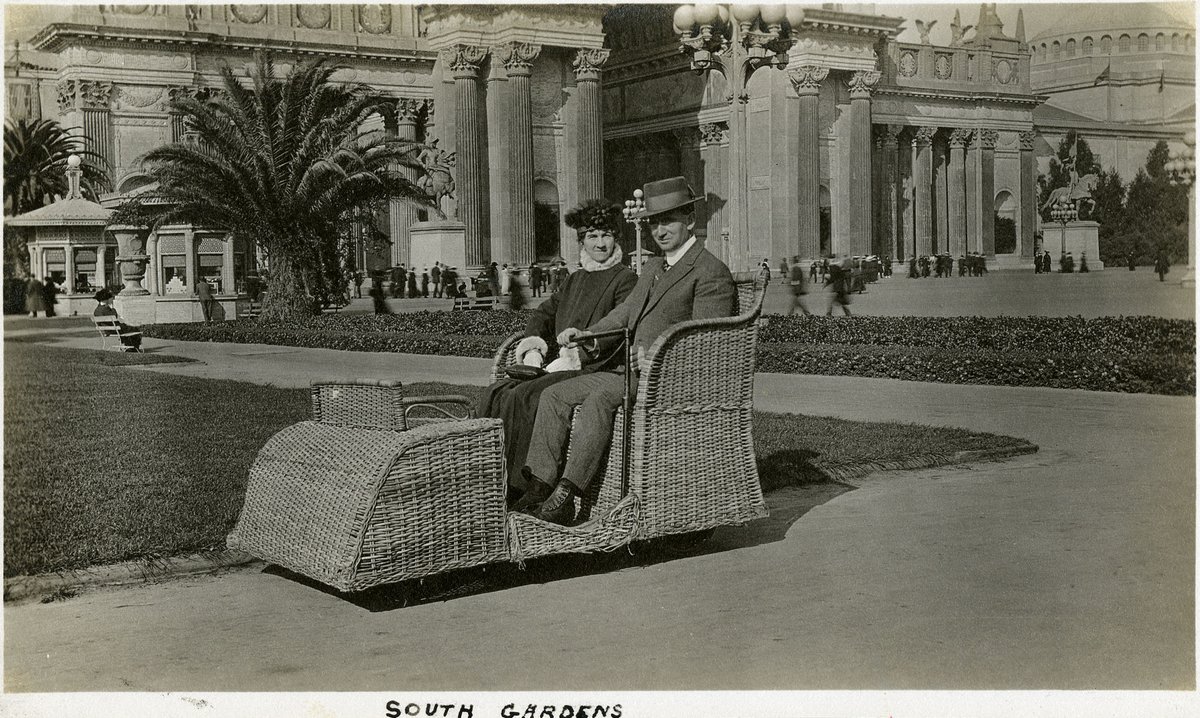Couple riding in an electric motor chair, also known as the Osborn Electriquette, at the Panama-Pacific International Exposition in San Francisco.

(📷 William M. McCarthy)