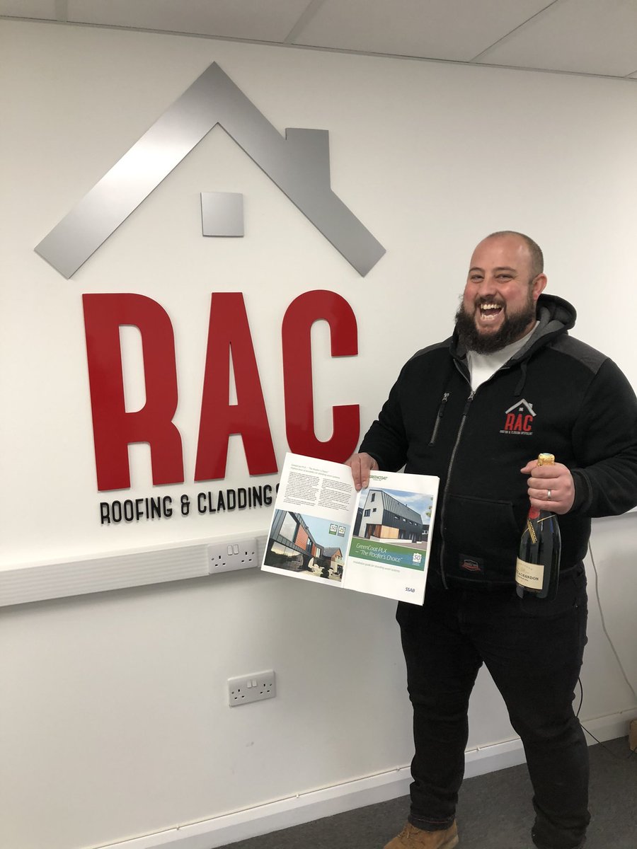 With appreciation for the project image used in the 2021 GreenCoat PLX Installation Guide.
Rob Clarke <a href="/RacRoofandClad/">RAC Roofing & Cladding Specialist Ltd</a> is presented with a bottle of champagne. Nice looking project. GreenCoat PLX is distributed by <a href="/metal_solutions/">Metal Solutions Ltd</a> available from stock in Pro &amp; Pural coatings