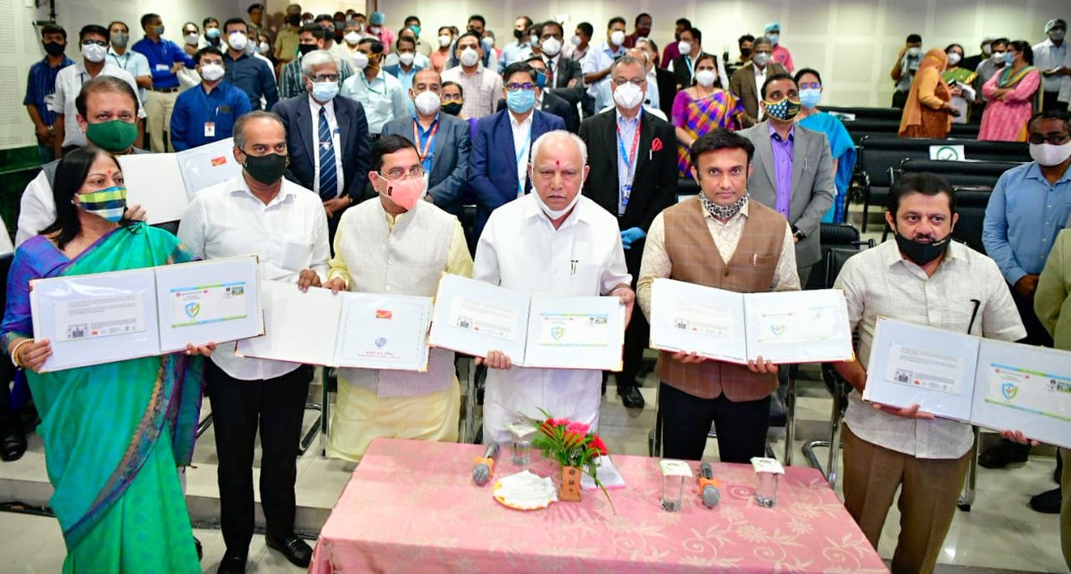 CPMGKARNATAKA's tweet photo. Release of Special Cover on launch of Covid-19 Vaccination today. In the picture, Smt. Sheuli Burman, PMG Bengaluru HQ, Shri.B.S.Yediyurappa, Chief Minister of Karnataka, Shri Pralhad V Joshi, Union Minister, Shri P.C.Mohan, MP, Dr. K. Sudhakar, Minister of Health Karnataka etc . https://t.co/IzynfHcbcV