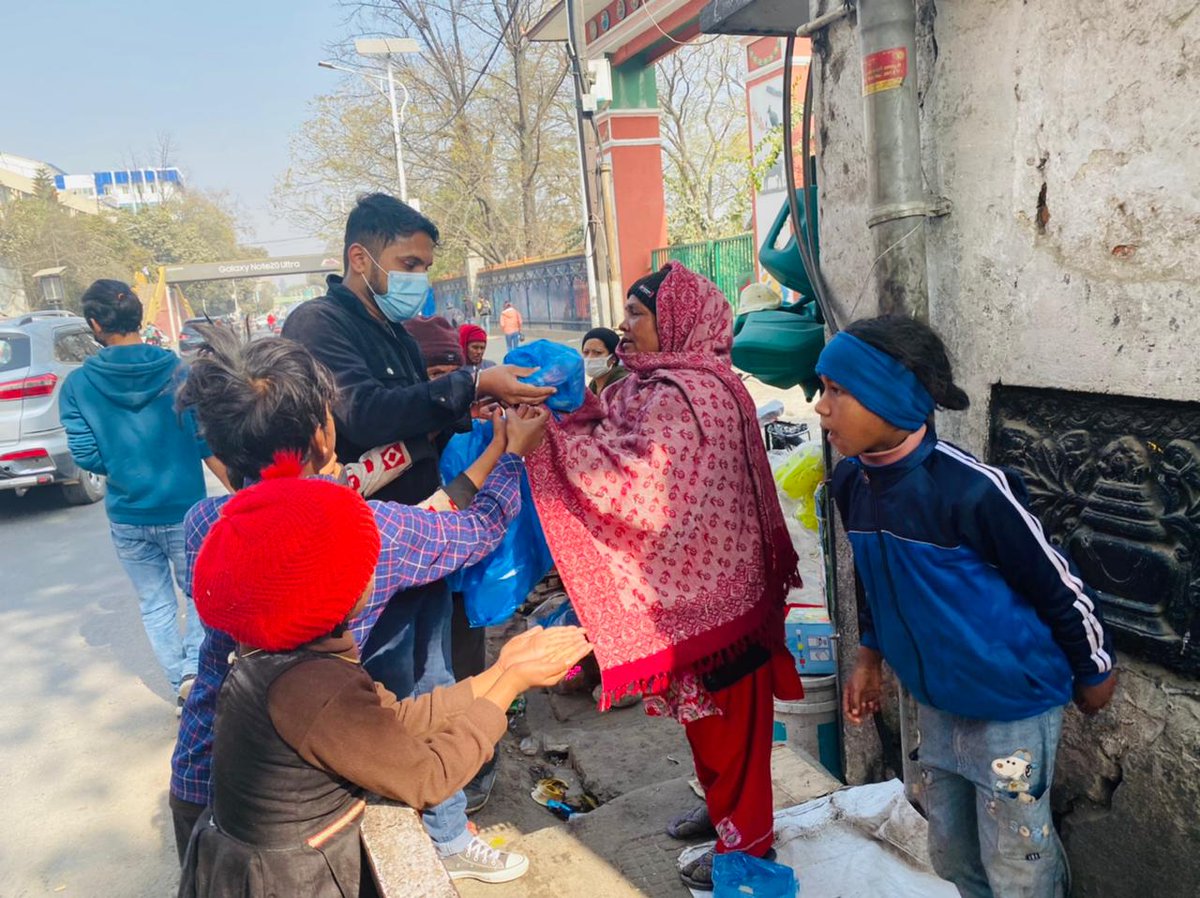 teamsrknepal's tweet photo. We celebrated #8YearsOfTeamSRK in Kathmandu earlier today by distributing food packages to street beggars outside temple!

Congratulations @teamsrkfc and love to @iamsrk 😍

#ShahRukhKhan #TeamShahRukhKhan https://t.co/CDajgmaHdK