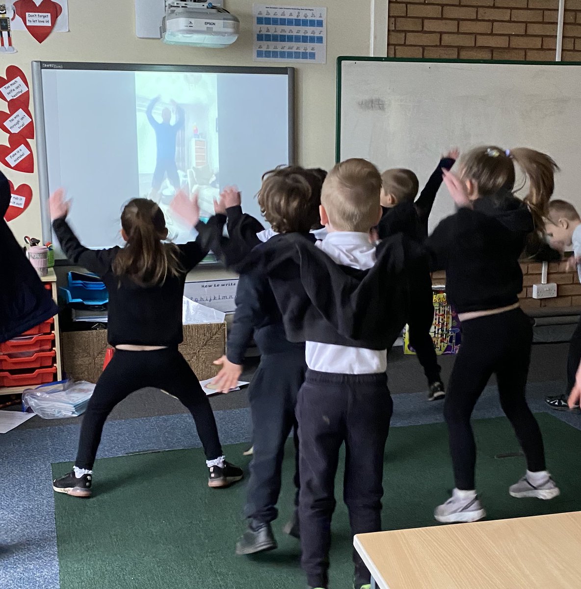 rquellinsclass's tweet photo. Year 1 are really enjoying our PE session from St Bernadette’s very own Joe Wicks, Coach Scott! Mr Davies is posting amazing activities to keep us active on Class Dojo that you can do at home too! Anyone else got sore legs today Year 1?! 😆💪🏻 @StberniesPe https://t.co/PNbYmqADWt
