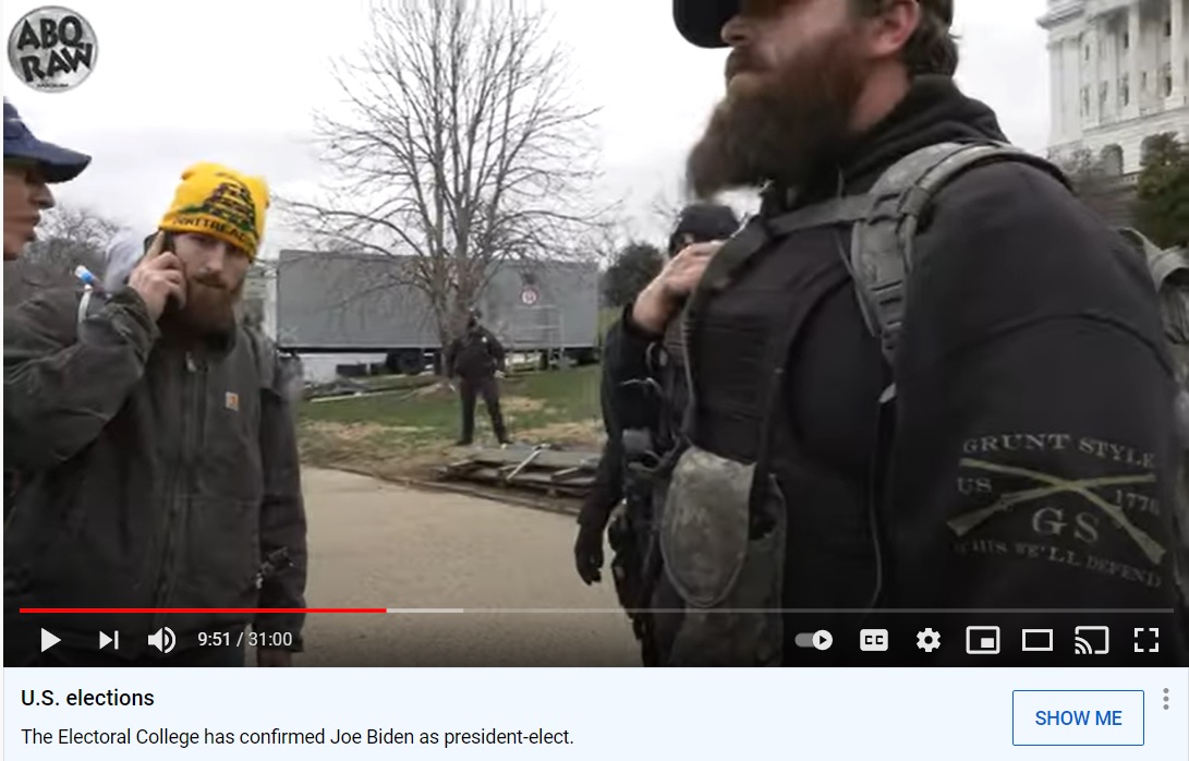  #breachteam6 Guy with glasses looking at  #bigmagacamo can also be seen in this footage talking to this very military looking guy  #gruntstyle. They also mention someone's name.  #tallglasses  #yellowtread   #SeditionHunters Show up later in the siege?