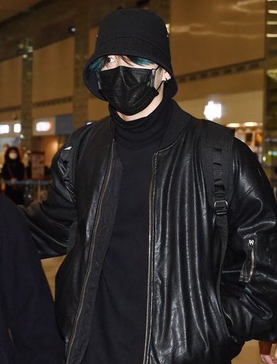 his blue hair peeking out