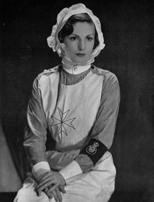 BNArchive's tweet photo. 'Lady Willoughby de Broke in Nurse's Uniform' - Rachel Lady Willoughby de Broke poses in her uniform as Lady County Officer of the St John's Ambulance Association, Warwickshire, The Tatler, 12 June 1940 https://t.co/qxqVKEGG4C #SaturdayStyle #UniformHistory #HistNursing https://t.co/ZxvQXmWrMH