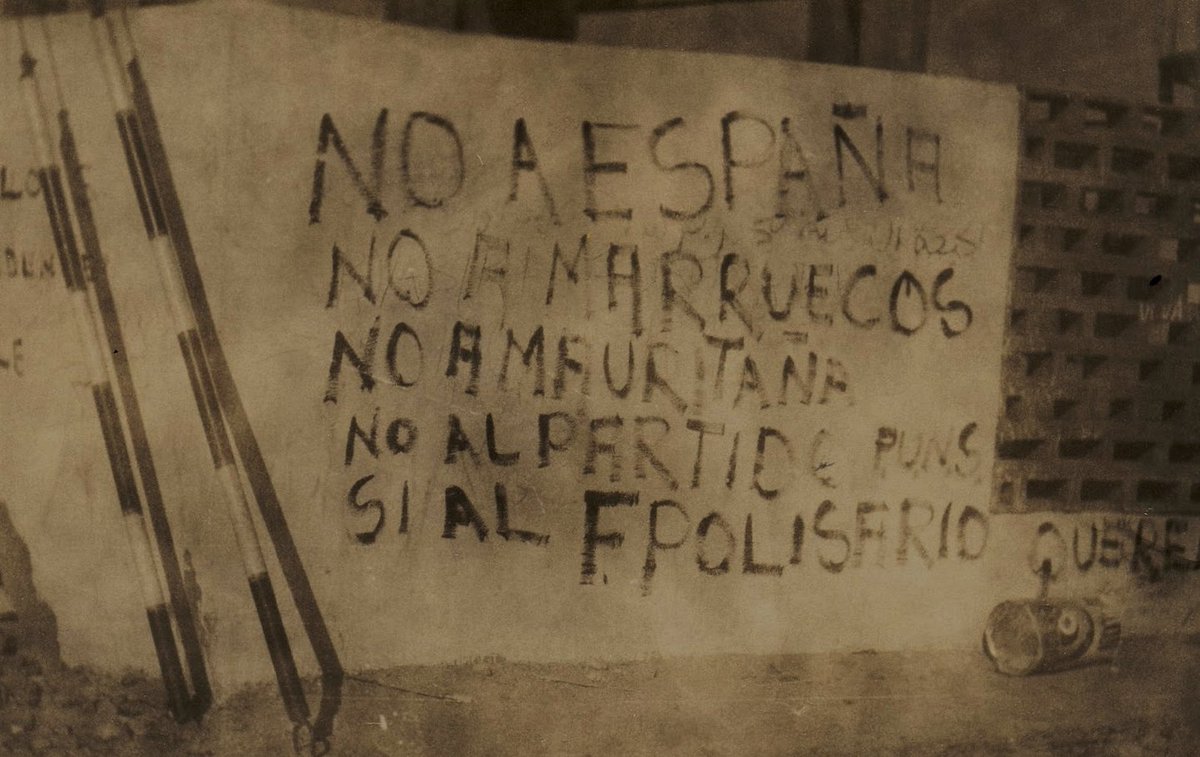 4-The leader of the PUNS, Khalihenna Ould Errachid, had one job: to try and persuade Saharawi people that they were better off with Spanish colonialism than independent. But the people of Western Sahara saw the scam for what it was, and graffitis like this one appeared on walls: