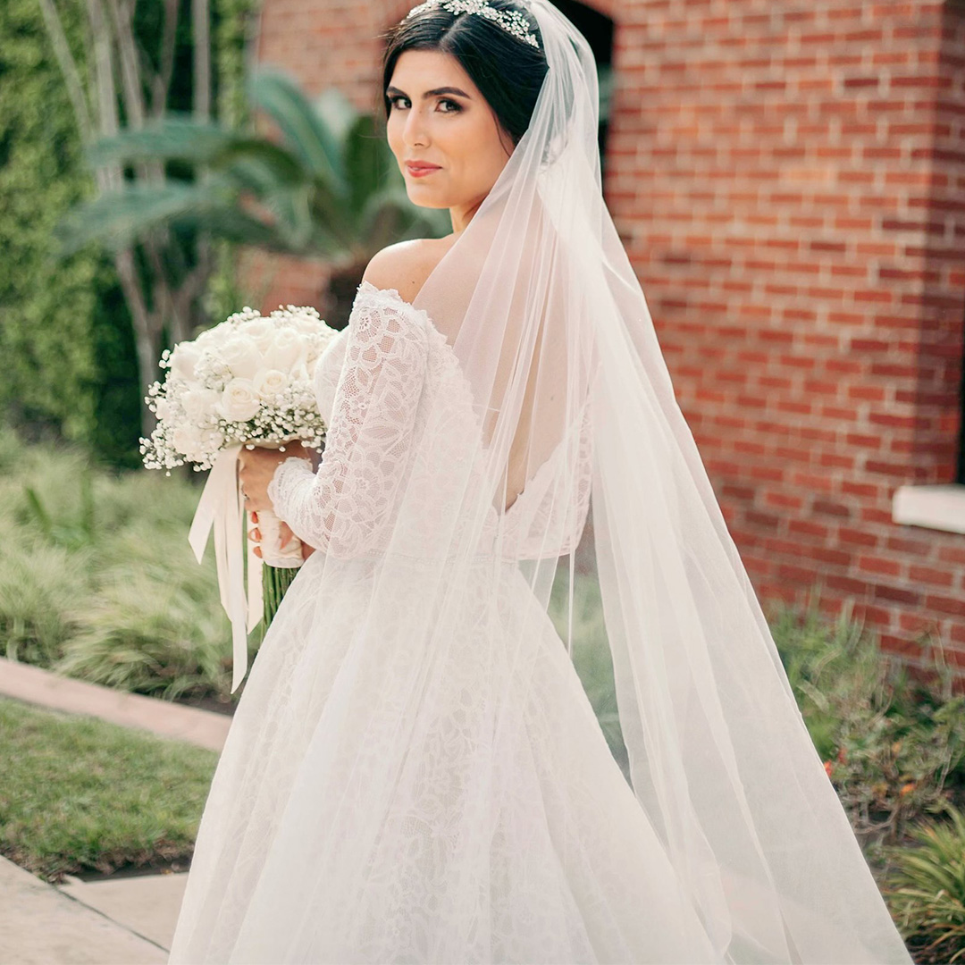 Featuring dreamy ivory lace which envelopes throughout the gown, a flattering #Aline and a full #longsleeve, Libby~120109 is the perfect match for the #romantic and classic #bride. Case in point: our stunning #callabride Leilani! 🌹