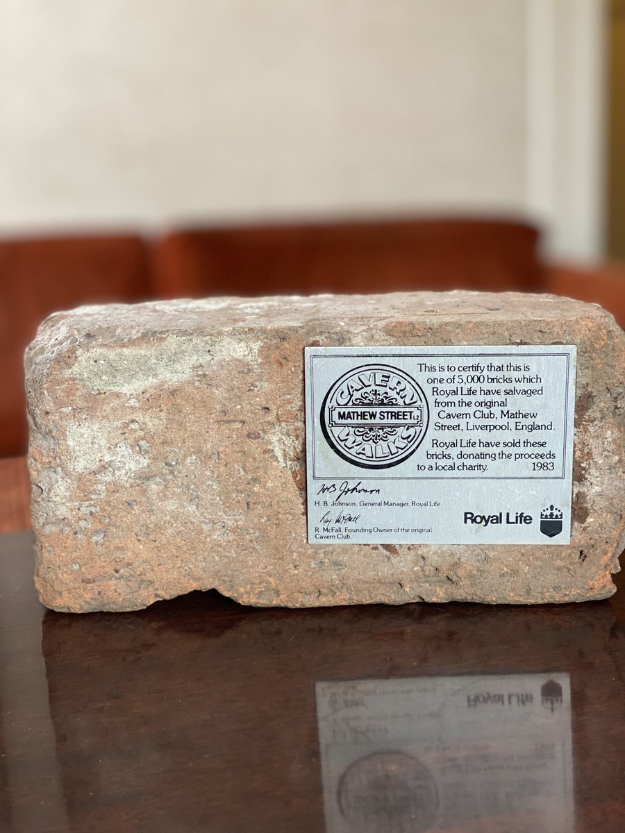 fabfourfan's tweet photo. This beloved brick has set in my office for over 20 years now, and reminds me of the magic I felt every time I descended those steps. Happy 64th, @cavernliverpool! I’ll be back when the virus retreats! https://t.co/a4jnmypH4E