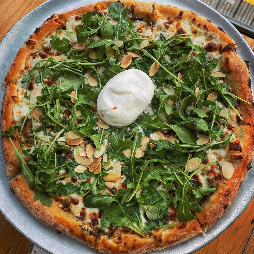 Industrykitnyc's tweet photo. Burrata has our heart!💚 Try our wood-fired Burrata al Tartufo pizza for yourself, you know you want to!😉 #industrykitchen (📷 @nycfoodbaby) https://t.co/FoCefDXJAU