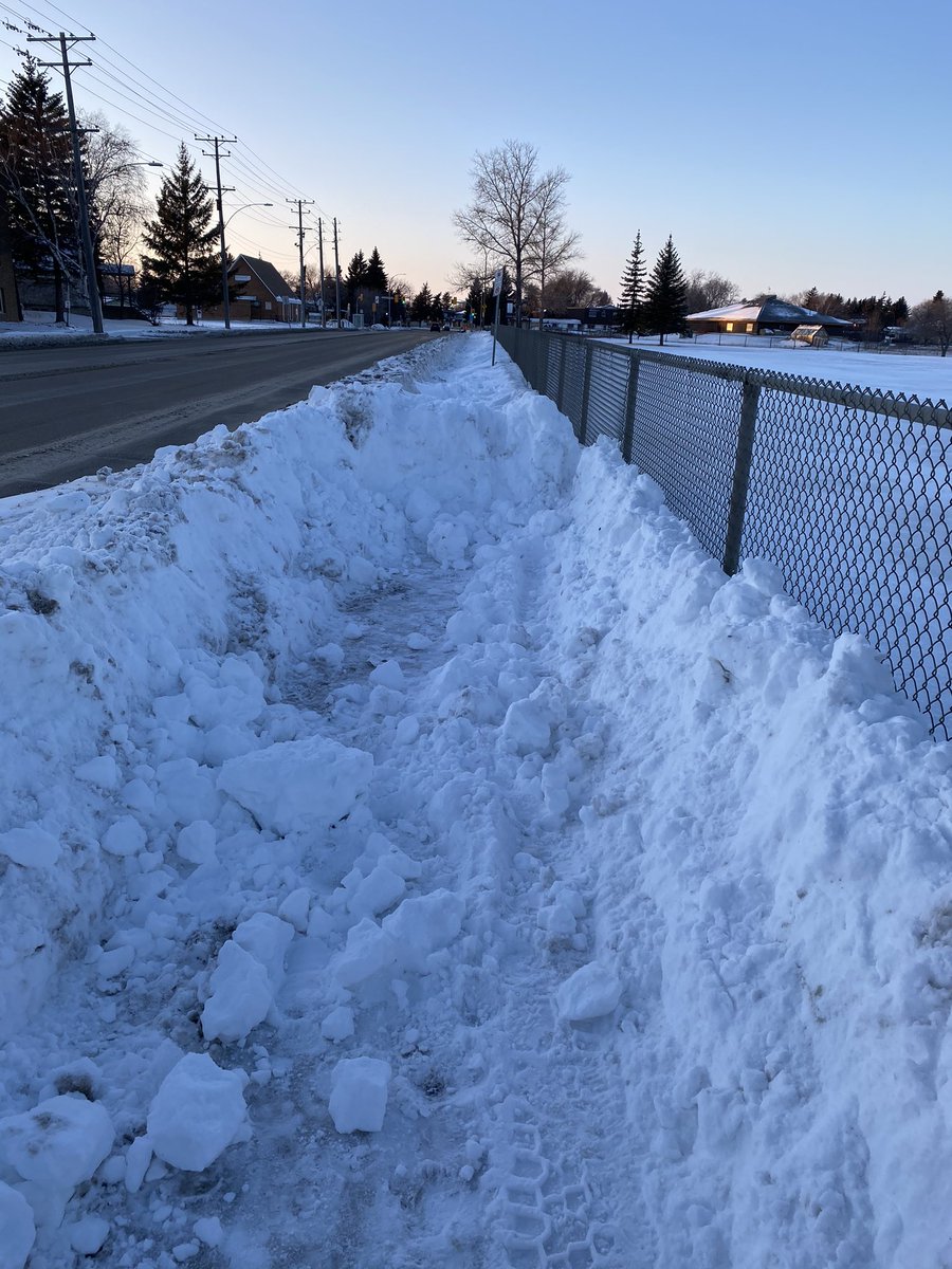 Danickor's tweet photo. Hey @cityofwinnipeg @Mayor_Bowman what’s up with this? Coming home from a nice walk &amp; sidewalk completely blocked. East of @CSHC_Huskies on North side of Ness. Will be a huge problem for many kids on Monday. Can we get this cleared, please?? https://t.co/AHsVBVLxXN