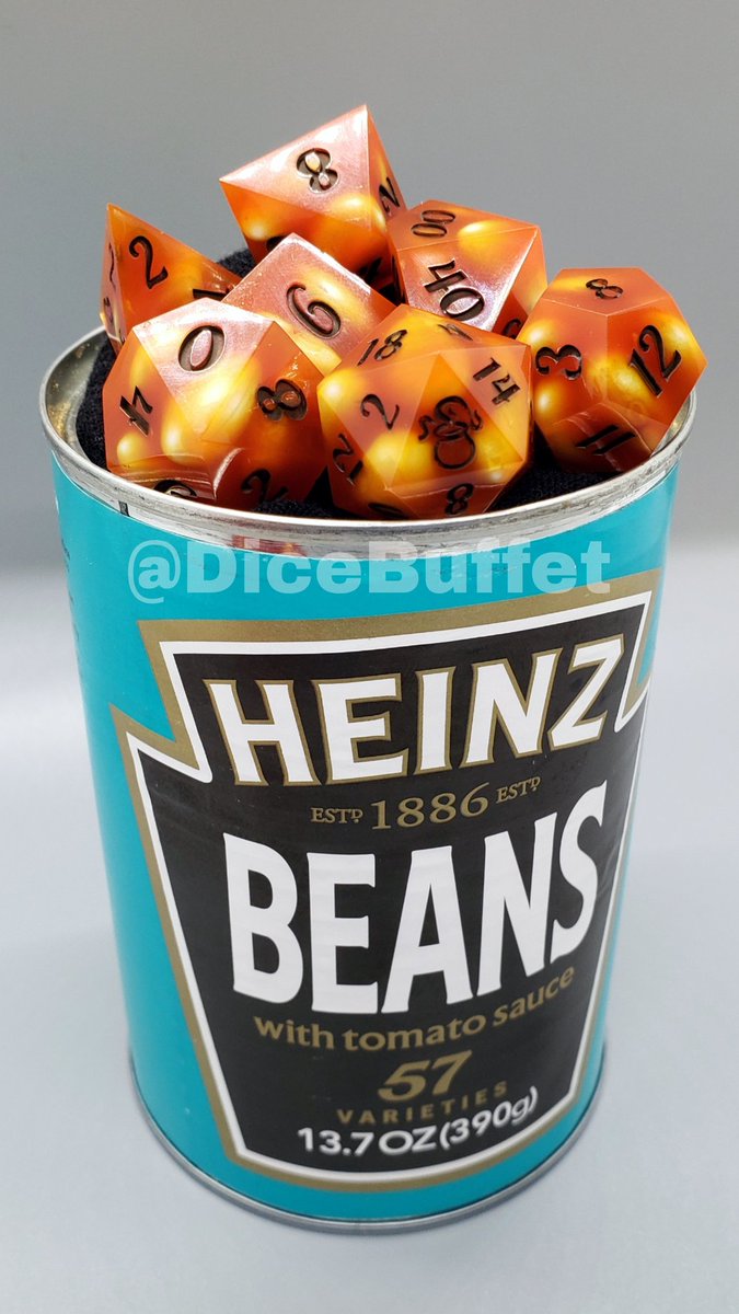 Resin dice made with dried beans to look like canned Heinz beans.