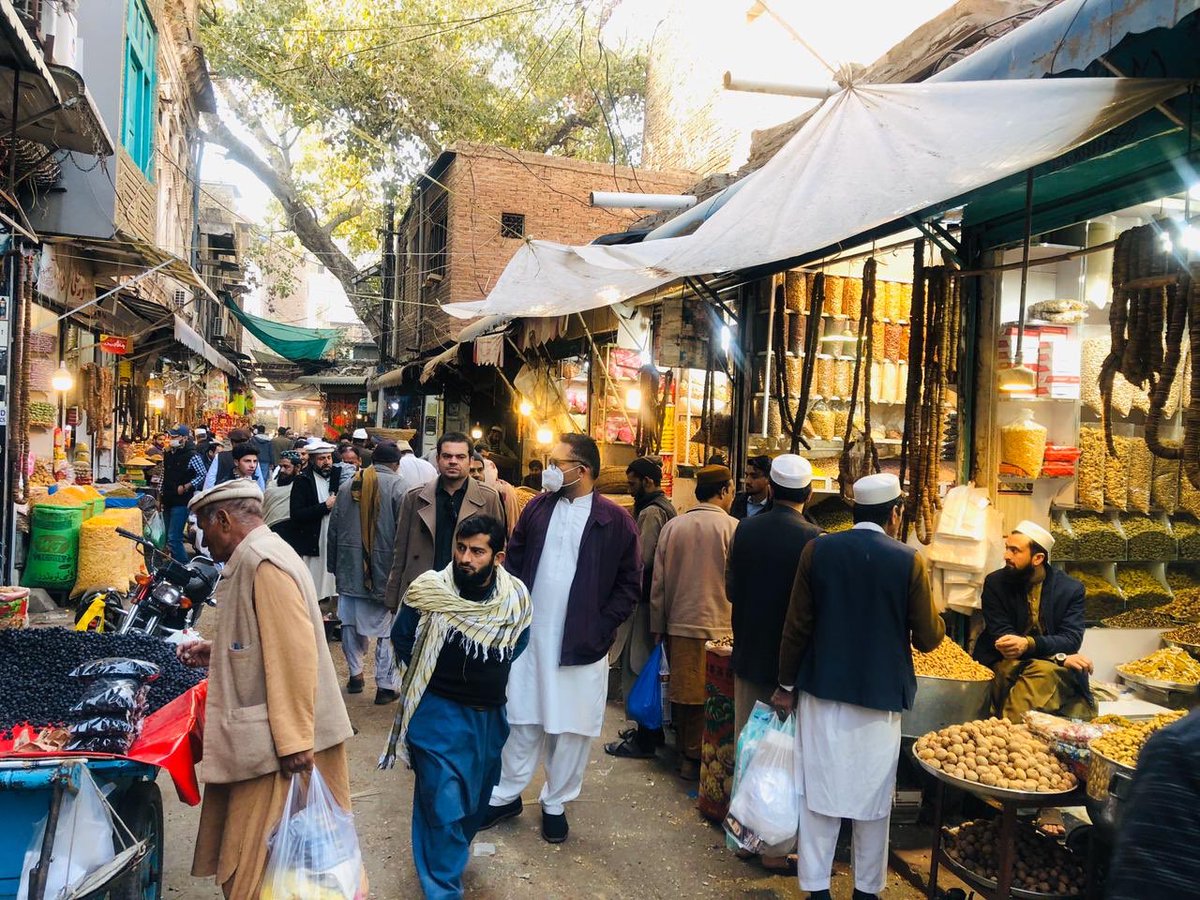 The narrow lanes lead to the wider hustle and bustle of the People Mandi Peshawar, one of the main trade hubs of the city where tales of how the pandemic has lead to an economic disaster are ripened