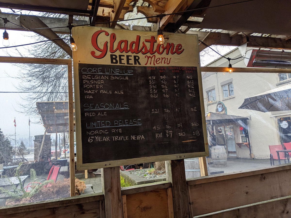 Rainy afternoon, but who cares, when there's a covered patio for drinking good beer and a enjoying a bite. @Gladstone_Beer #CourtenayBC