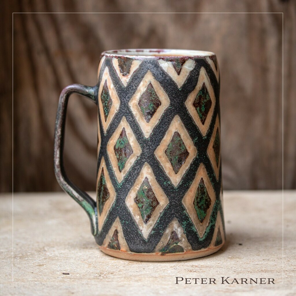 InTandemGallery's tweet photo. When you use a handmade mug like this one, something as mundane as drinking a cup of coffee is elevated to an intimate experience.

@peter_karner_pottery #uniquegifts #intandemgallery #visitbakersvillenc #ceramicgallery #bestceramicgallery #ceramic #ceramica #pottery #cerami… https://t.co/XgOJfk4oMp