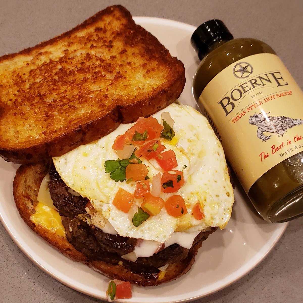 BoerneBrand's tweet photo. Homemade Patty Melt with Boerne Brand Texas Style Hot Sauce for that extra, flavorful ๐ฅ
.
.
.
#boernebrand #texas #style #texasstyle #hotsauce #jalapeno #flavor #savor #enjoy #heat #create #infuse #integrate #foodblogfeed #foodbloggers #SmallBusiness #smallbatchcrafted https://t.co/YUJOV5Q11F