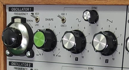 behringer included all of the VCO, VCF, ENV mods that were released over the years (most designed by Graham Hinton). these mods are immensely useful, in particular the range switching of the VCOs. The originals lacked all of these, and it would be painful to modify an original